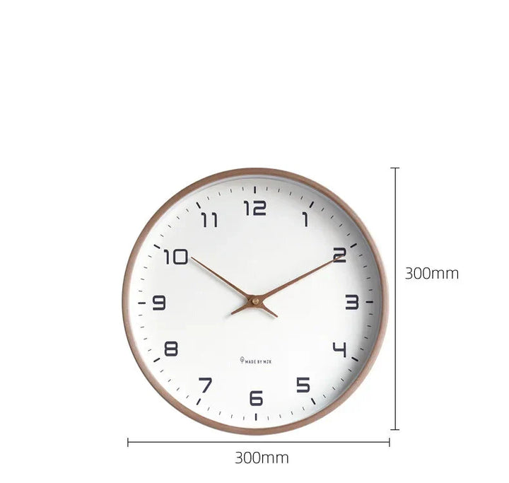 Minimalistisk lydløst vægur i rundt trædesign. Skaber ro og stil i ethvert hjem eller på kontoret.