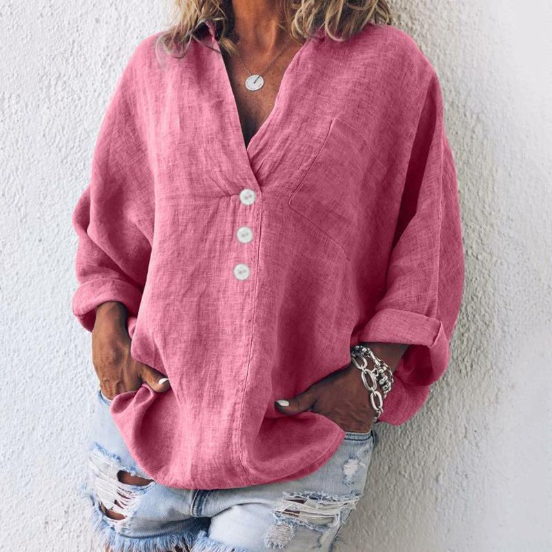 Lyserød dame V-hals oversize bluse med løs pasform og rulleærmer, perfekt til sommerhverdag.