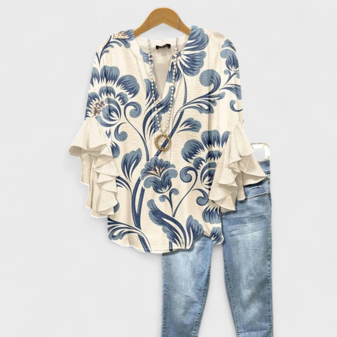 Lyserød letvægts damebluse til sommer. Komfortabel og elegant til afslappet fritidsstil.