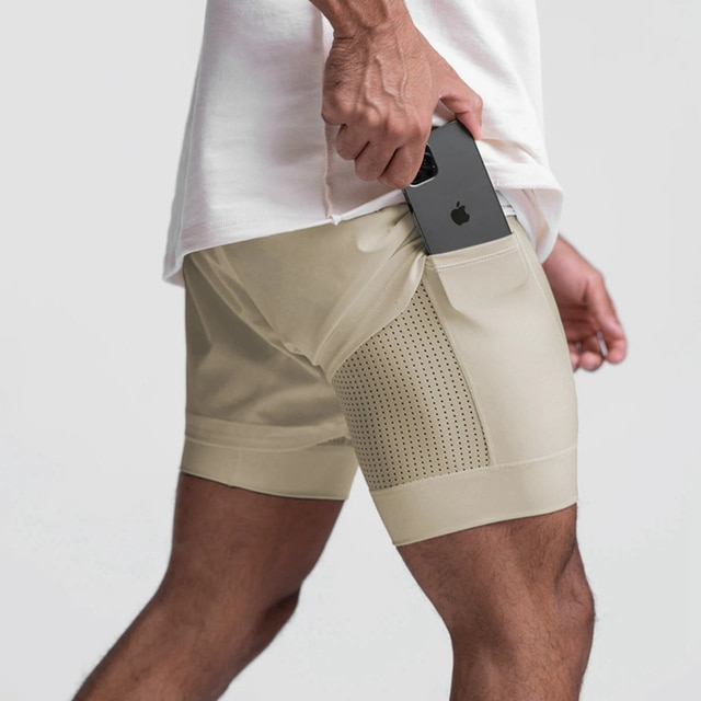 Mænds komfortable 2-i-1 fitness shorts i sort til optimal træning, med åndbart stof og indvendig kompression.