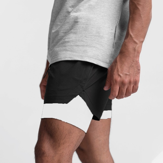 Komfortable mænds workout shorts, 2-i-1 design, giver fleksibilitet og støtte til alle fitness aktiviteter.