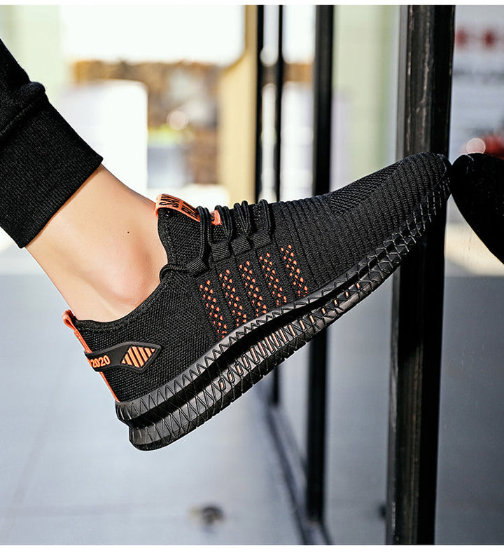 Komfortable mænds hverdagssneakers i åndbart materiale, perfekte til fritid og aktiv livsstil.