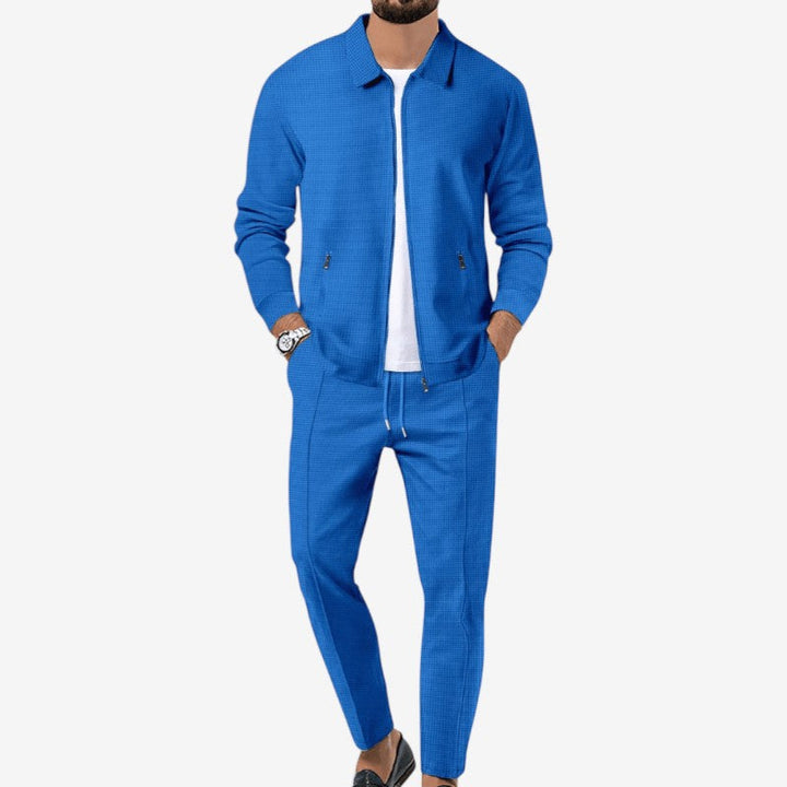 Mænds stilfulde 2-delte sæt med lynlåstop og slim bukser. Perfekt moderne casual fritidstøj.