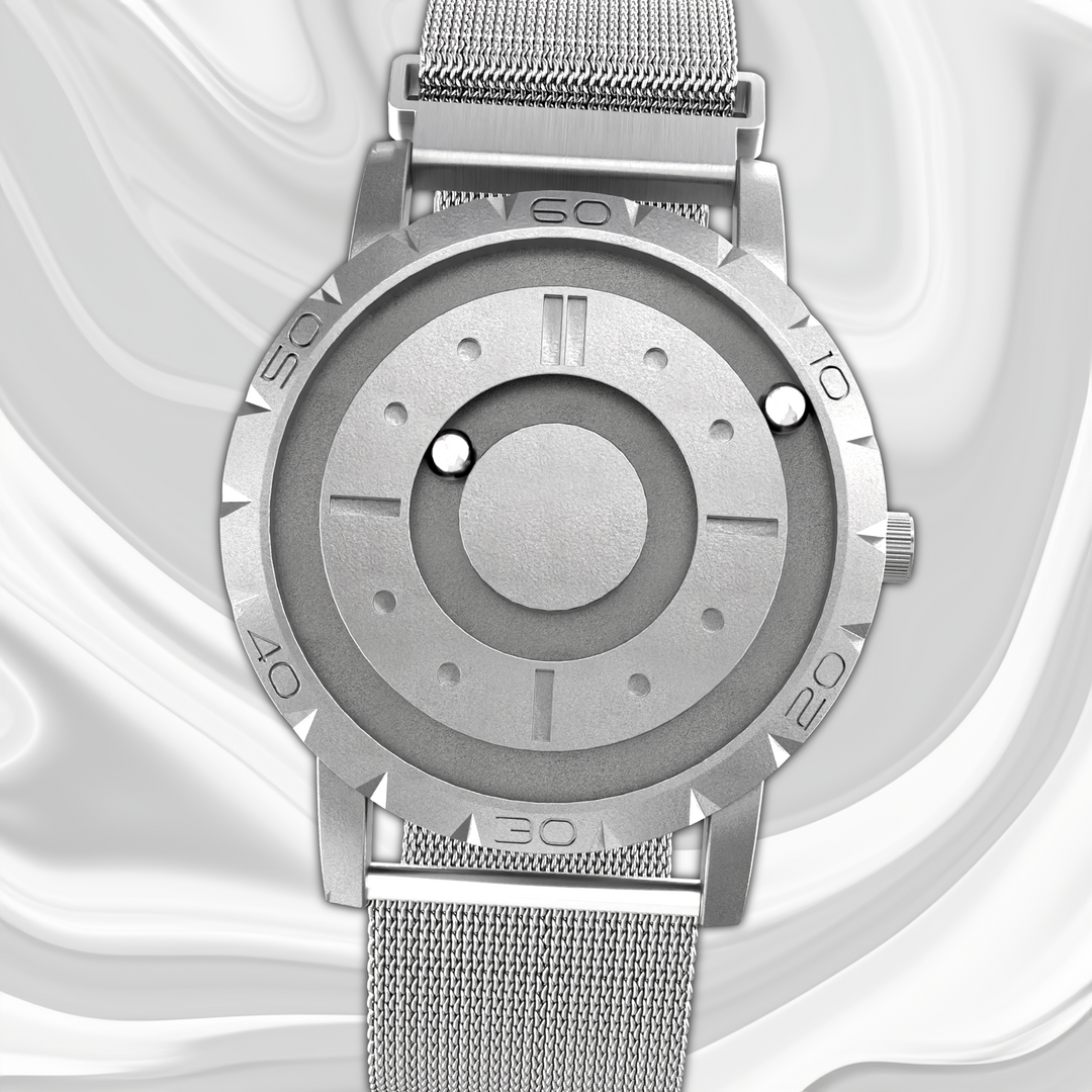 Magnetisk unisex ur med innovativ kugle-tidsaflæsning og elegant mesh armbånd.