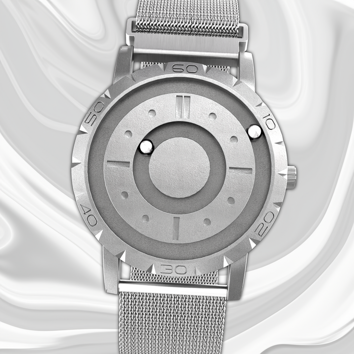 Magnetisk unisex ur med innovativ kugle-tidsaflæsning og elegant mesh armbånd.