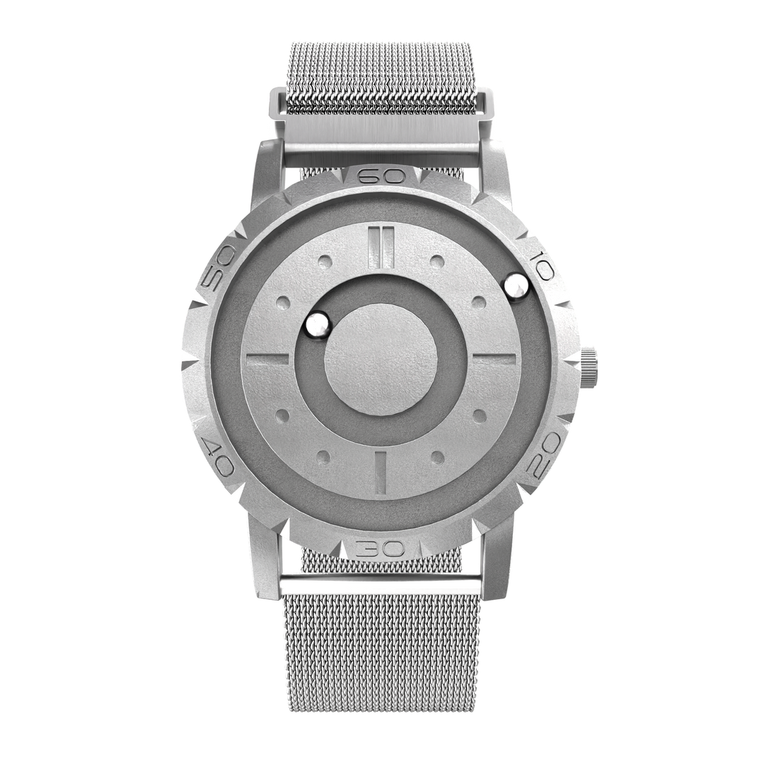 Elegant herreur med magnetisk kugle-display og behageligt mesh armbånd; moderne tidsaflæsning.