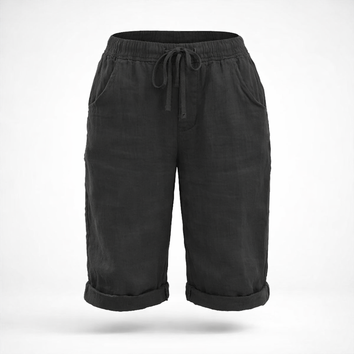 Komfortable dame capribukser med elastiktalje og moderne snit, perfekte til forår og sommer.