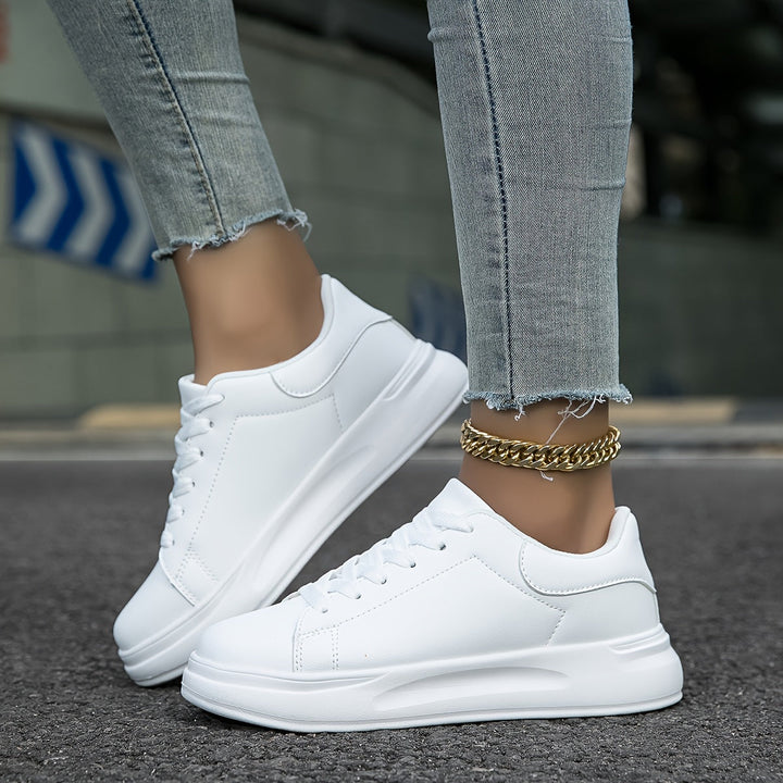Hvide Dame Sneakers med minimalistisk design, ultimativ komfort og moderne stil for enhver hverdag.
