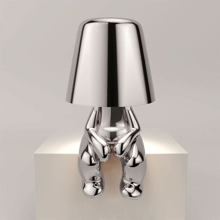Kompakt genopladelig LED bordlampe i moderne design. Trådløs og med dæmper til stemningslys.