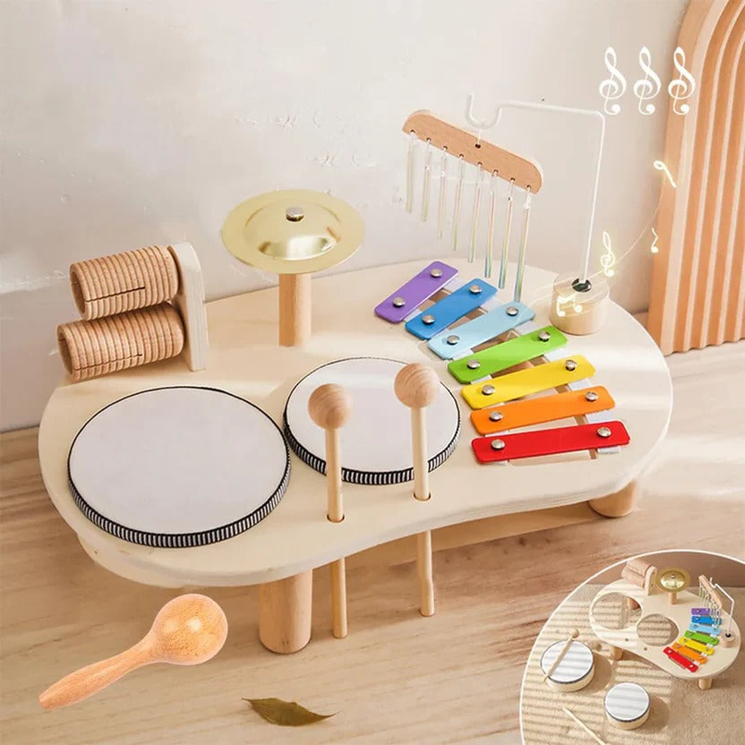 Montessori trommesæt i træ til børns musikalske udvikling og kreativ leg.
