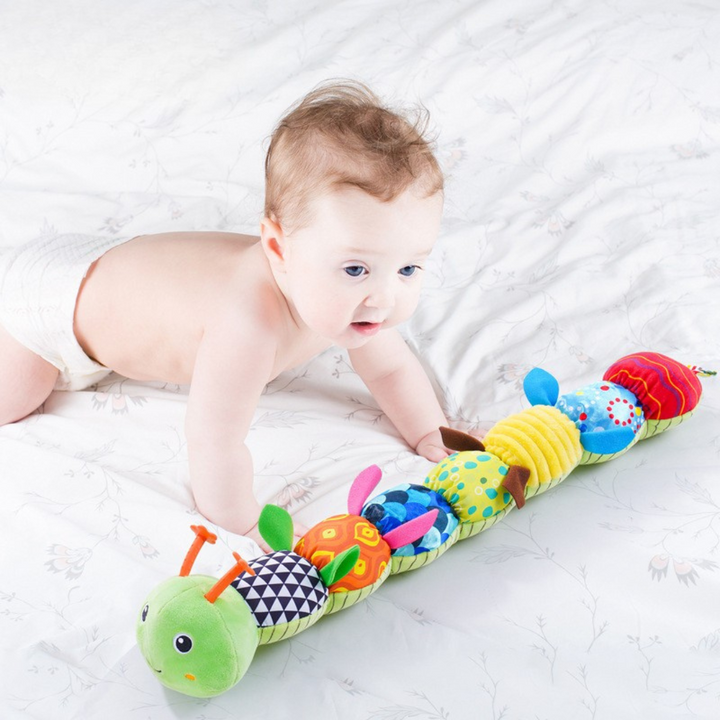 Aktivitetslegetøj til baby med multisensoriske funktioner for stimulerende leg og udvikling af sanser.