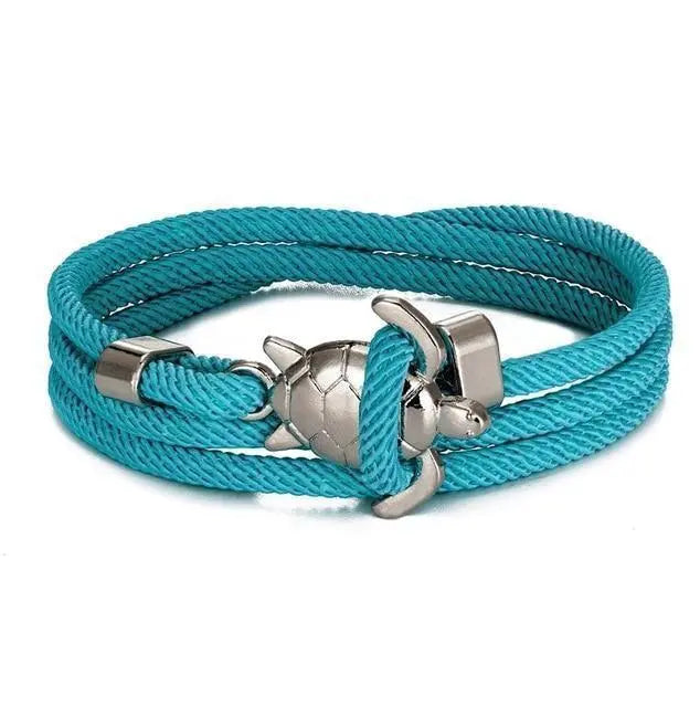 Justerbart reb armbånd med nautisk anker design. Trendy unisex accessories, perfekt til et sommerlook.