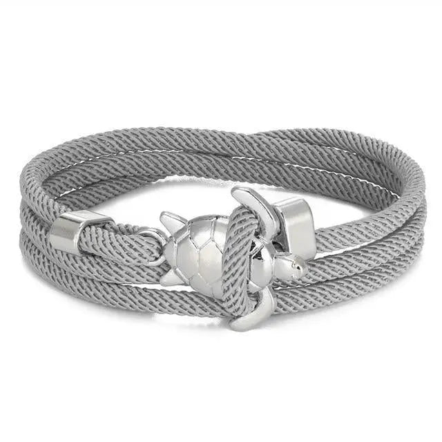Sommer anker armbånd i reb design. Letvægts unisex armbånd med justerbar pasform. En cool accessory.