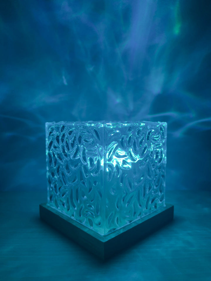 Nordlys projektor lampe skaber magisk aurora stemning. Ideel for afslapning og hygge i hjemmet.