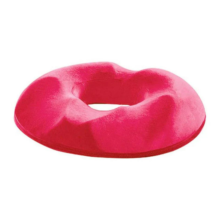Komfortabel blå sædepude i memory foam, giver halebenaflastning. Ergonomisk rygstøtte for bedre siddestilling.