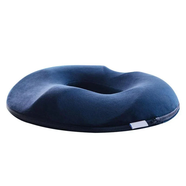 Ergonomisk komfortpude til bilsæde og kontorstol. Optimerer halebenaflastning, rygstøtte og siddekomfort.