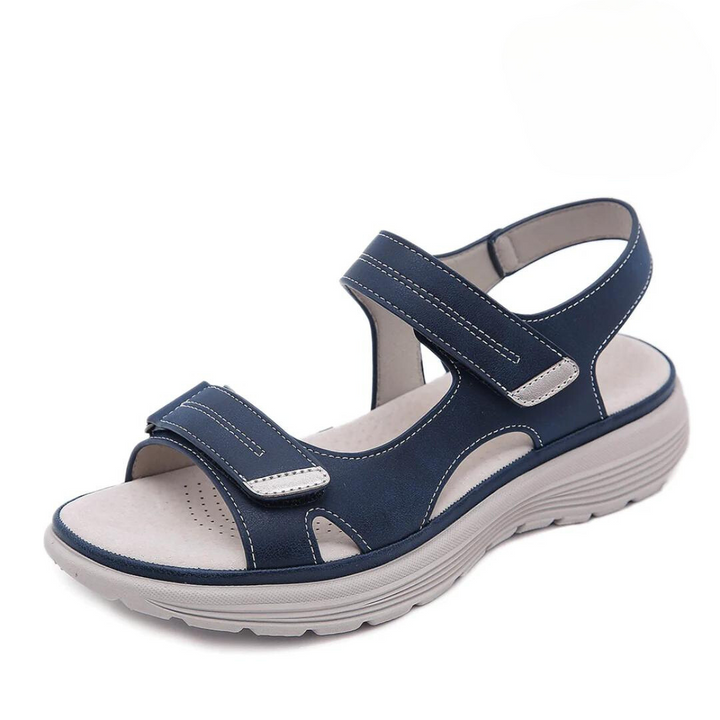 "Ortopædiske sandaler med ergonomisk design, bred tåboks og svangstøtte, perfektioneret for maksimal komfort og stabilitet."