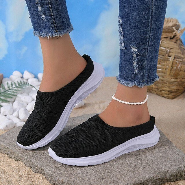 "Ortopædiske slip-on sneakers i grå mesh, lette at bære, med støtte og stil, perfekt til både hverdag og formelle lejligheder