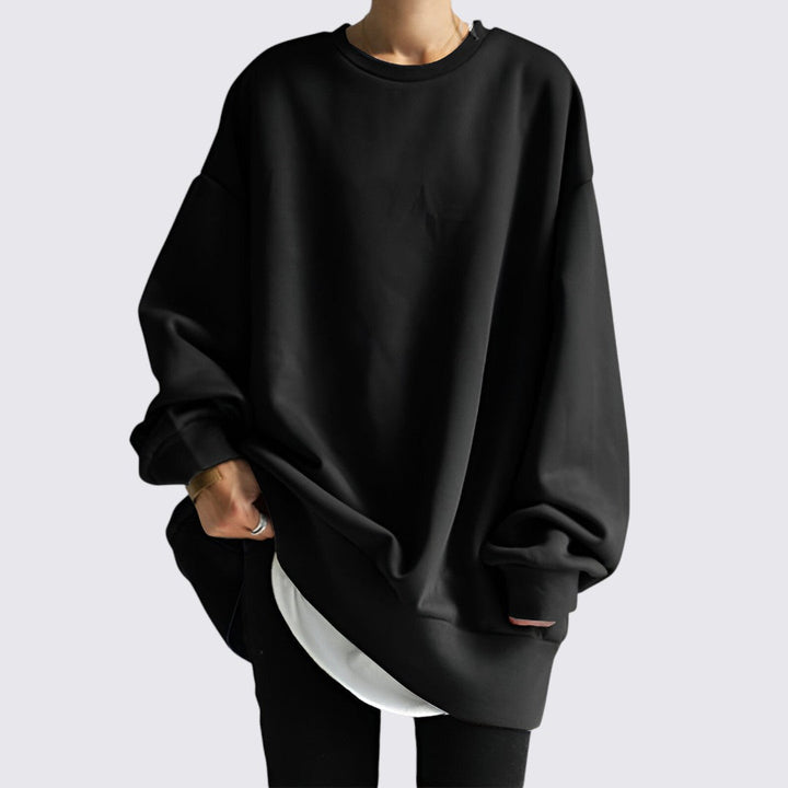 Komfortabel oversized sweatshirt til damer. Løs pasform og rund hals, perfekt til hverdagsbrug.