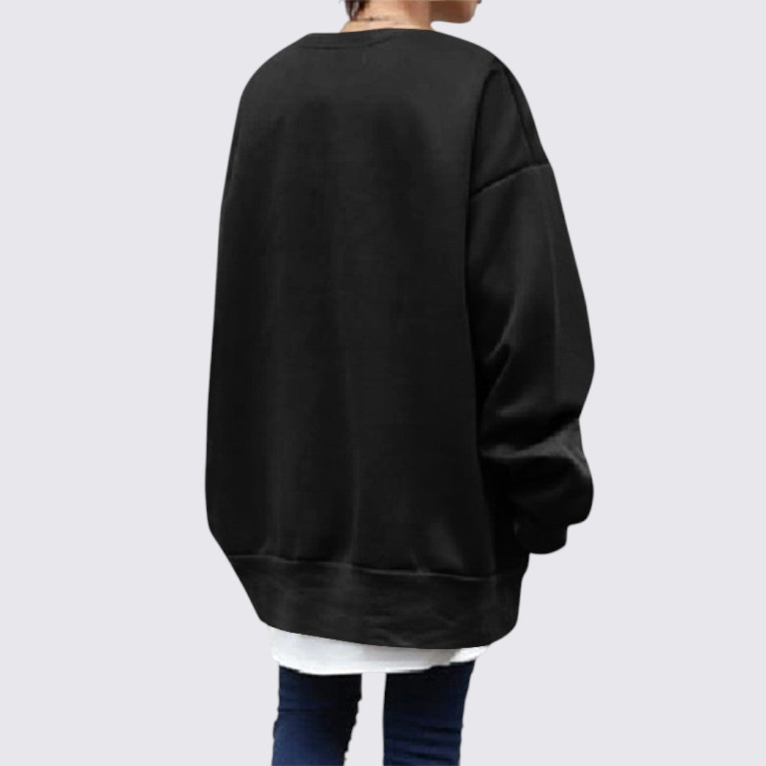 Blød, langærmet dame sweatshirt med rund hals. Ideel til afslappet hverdagsbrug og streetwear.