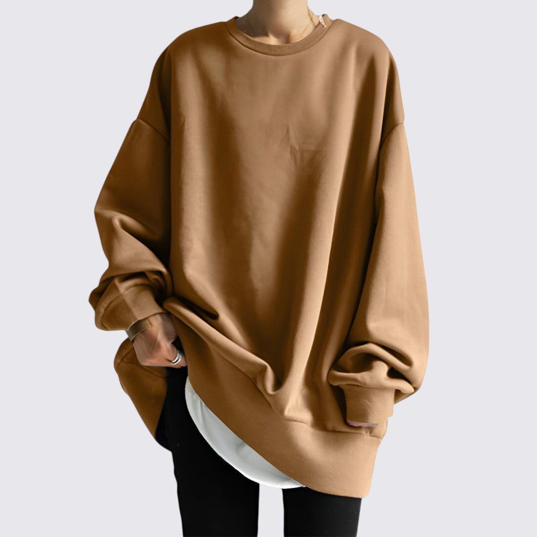Afslappet oversized sweatshirt til kvinder. Rund hals, komfortabel pasform for hverdagsbrug.