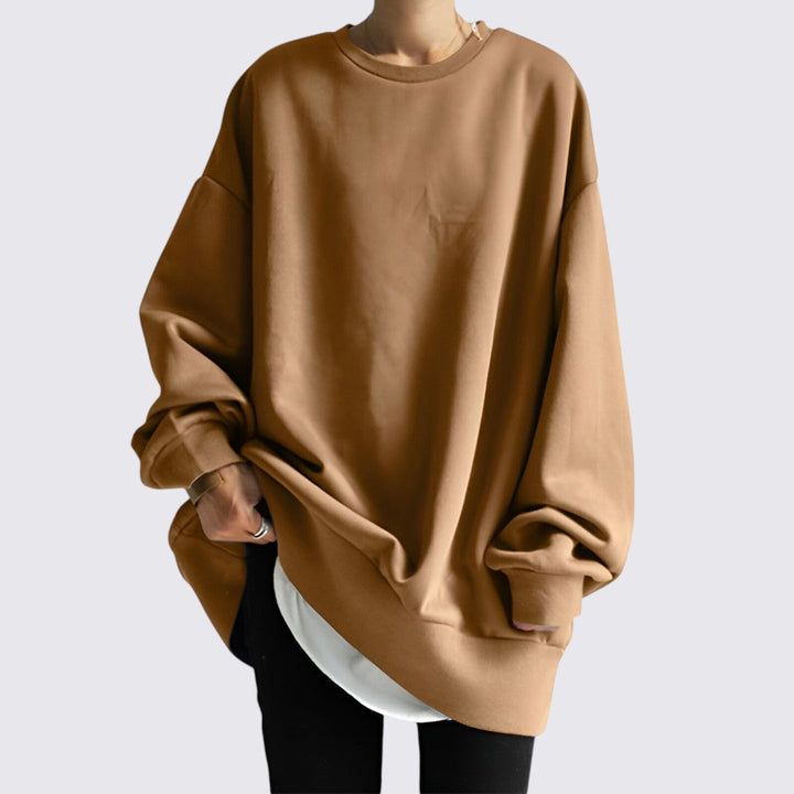 Afslappet oversized sweatshirt til kvinder. Rund hals, komfortabel pasform for hverdagsbrug.