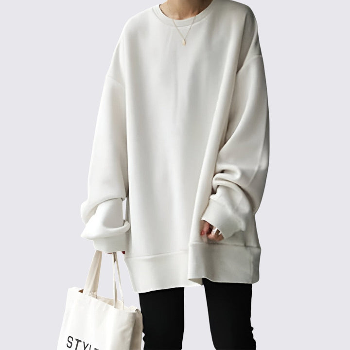 Dame sweatshirt i oversized pasform. Rund hals, blødt materiale, perfekt til afslappet og komfortabel stil.