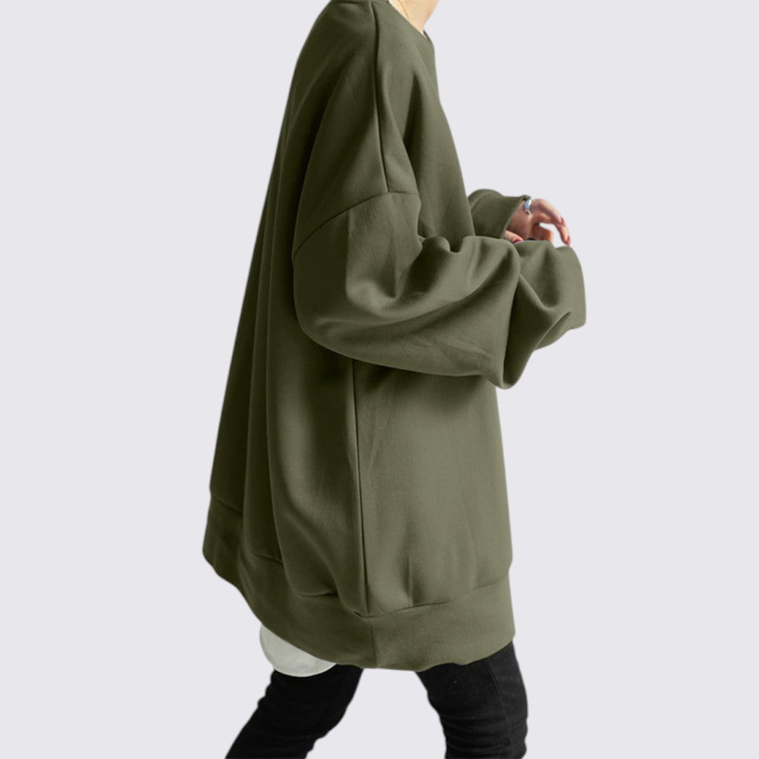 Moderne streetwear dame sweatshirt. Oversized model med rund hals og langærmet design for cool komfort.