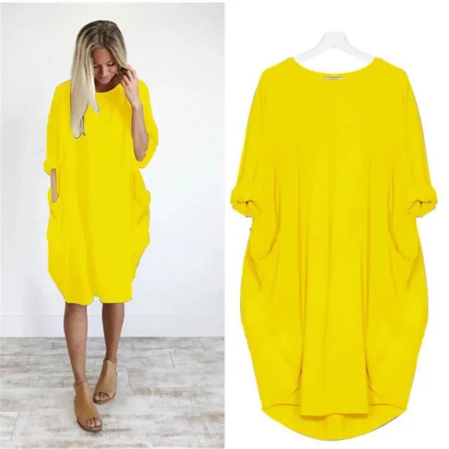 Stilfuld hverdagskjole i plus size med lommer og elegant snit.