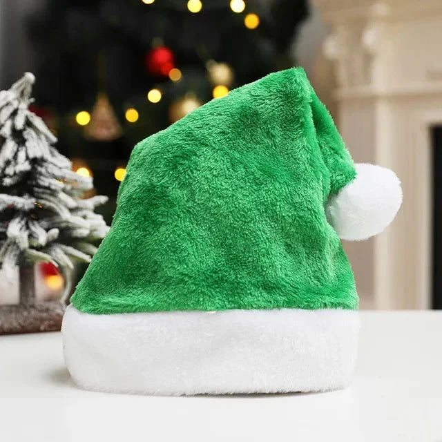 Festlig rød julehue med fluffy hvid pelskvas. Ideel hovedbeklædning til julens hyggelige fester.