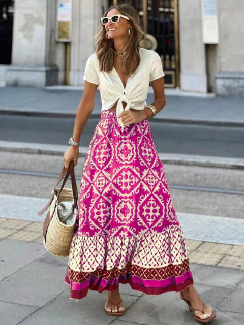 Retro Boho lang sommer nederdel i pink, blød og flydende, perfekt til sommeraftener, bohemisk stil, let materiale.