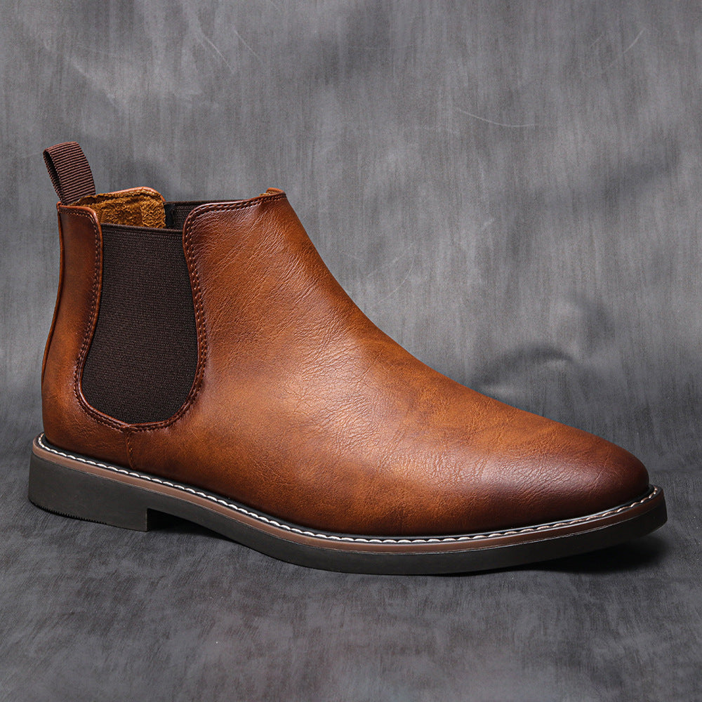 "Retro Chelsea-støvler til mænd, brun læder, slip-on design, polstrede indersåler, gummisåler for optimal komfort."