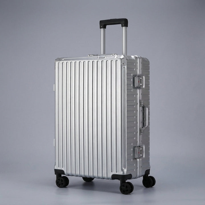 Sikker rejsekuffert med hård skal, robust aluminiumsramme og TSA-lås; holder din bagage tryg.