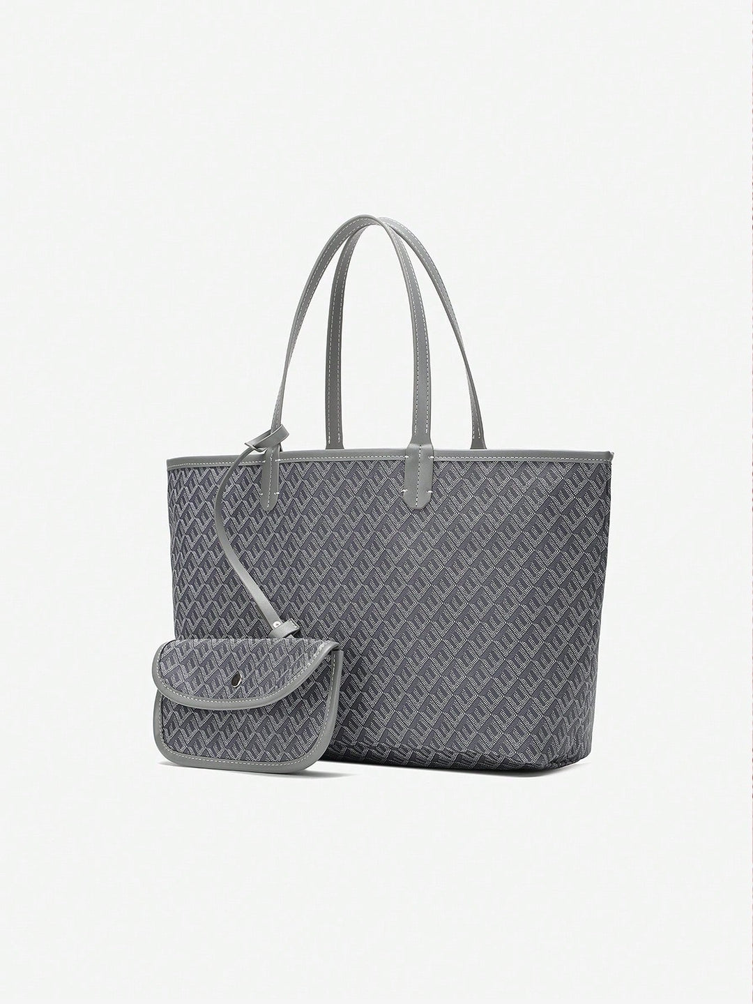 Moderne kvindetaske med grafisk print, rummelig shopper der matcher damemoden.
