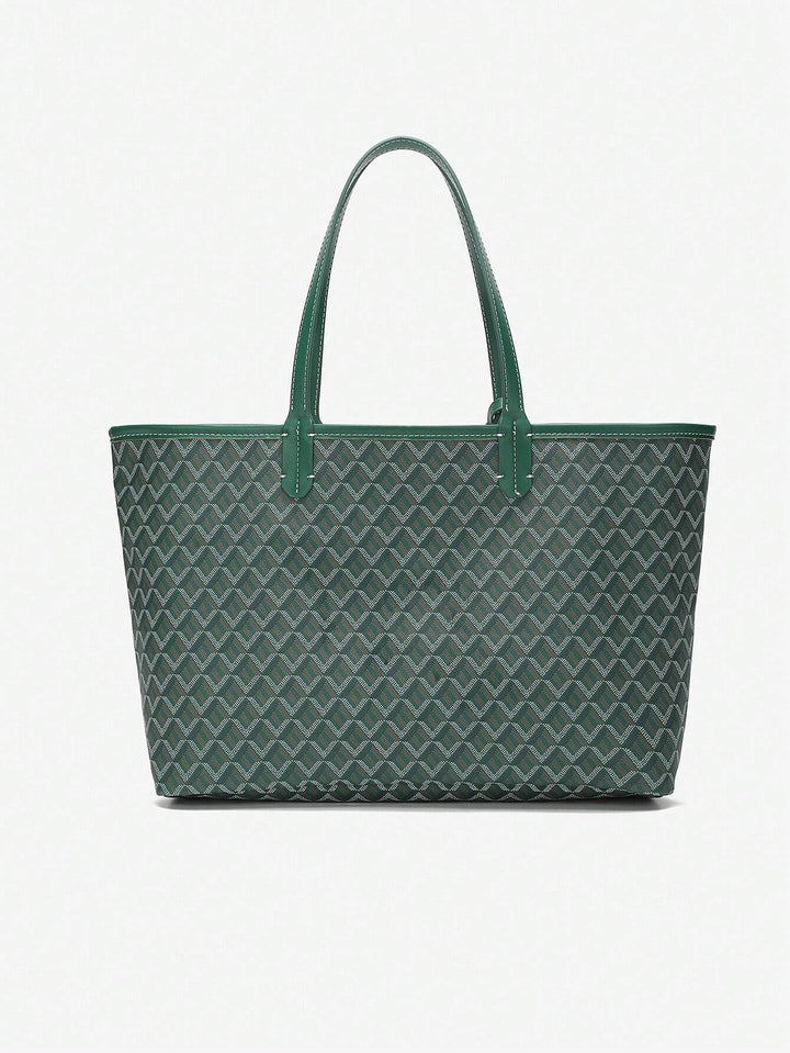 Sort/hvid grafisk shopper, en rummelig og moderne dametaske med aftagelig pung.