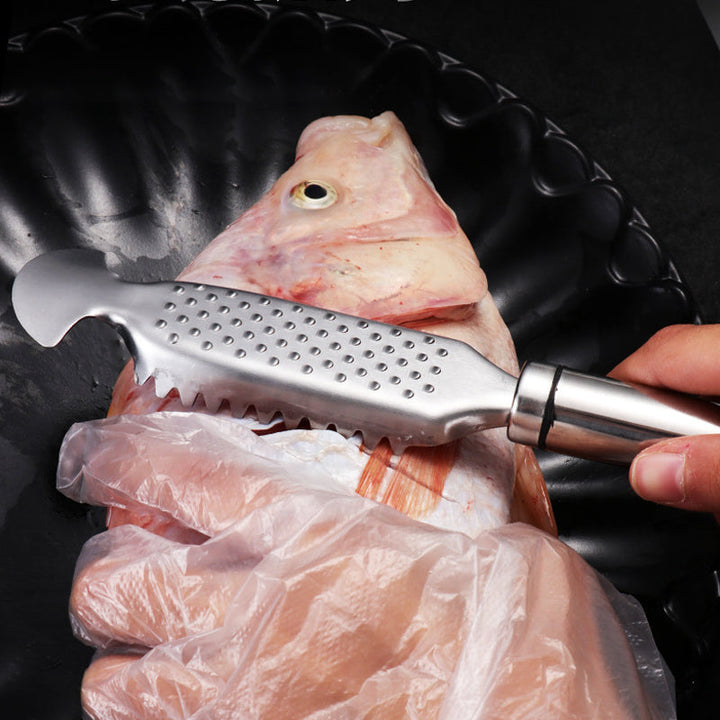 Holdbart fiskeskæller multiværktøj i rustfrit stål. Gør skalning af fisk hurtig og nem.