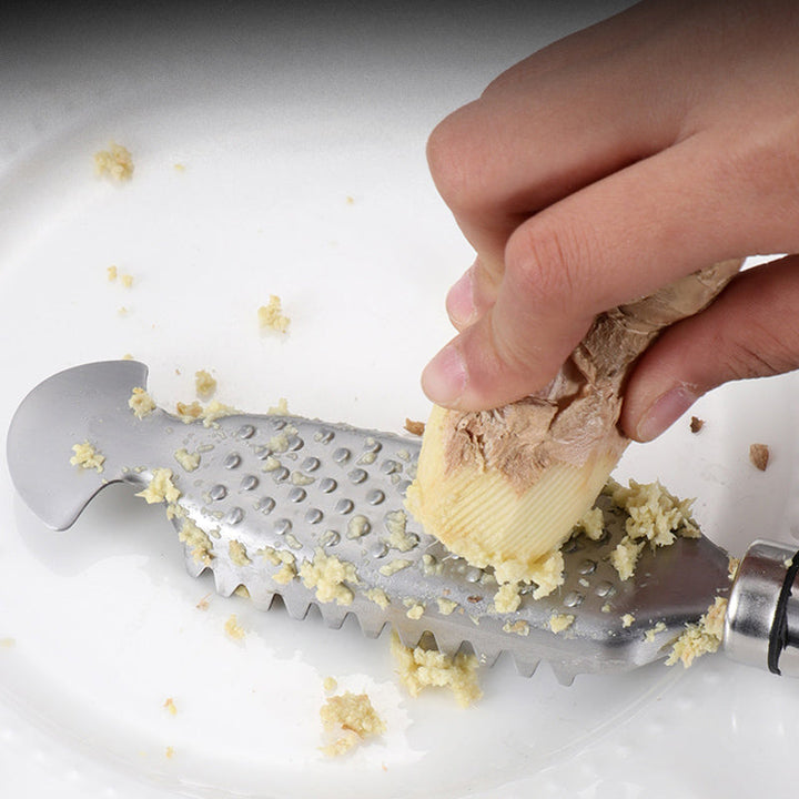 Effektivt køkken multiværktøj i rustfrit stål. Spar tid på forberedelse af fisk, urter og citrus.