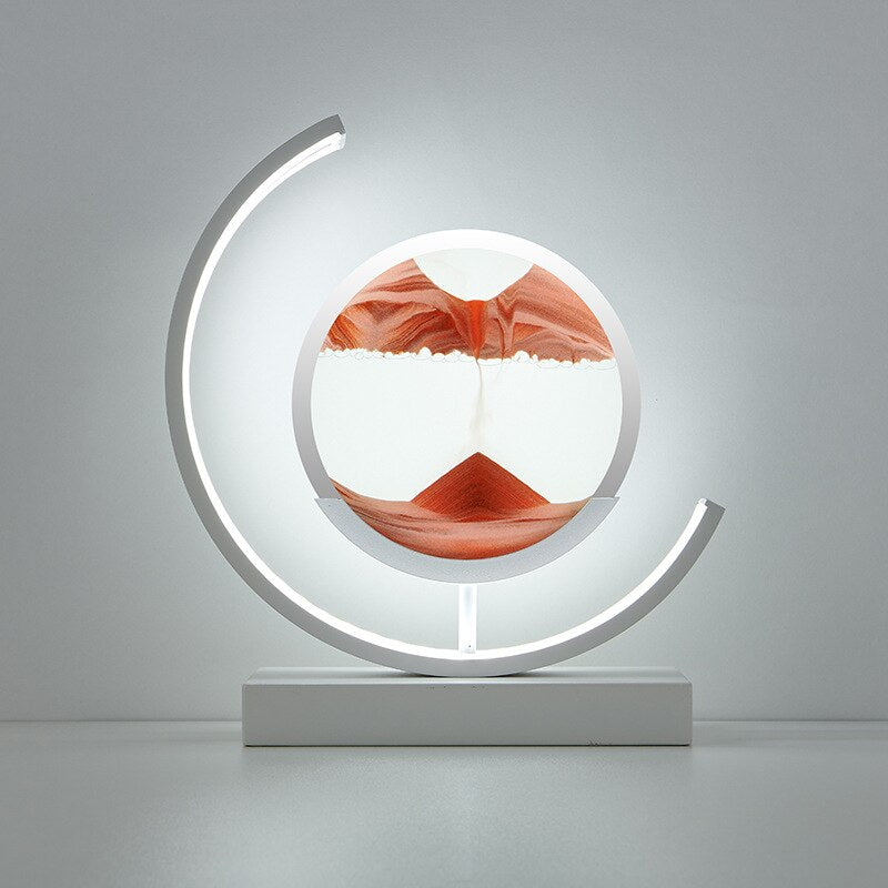 Moderne sandbordlampe med beroligende lys og unikt design, en essentiel del af indretningen.