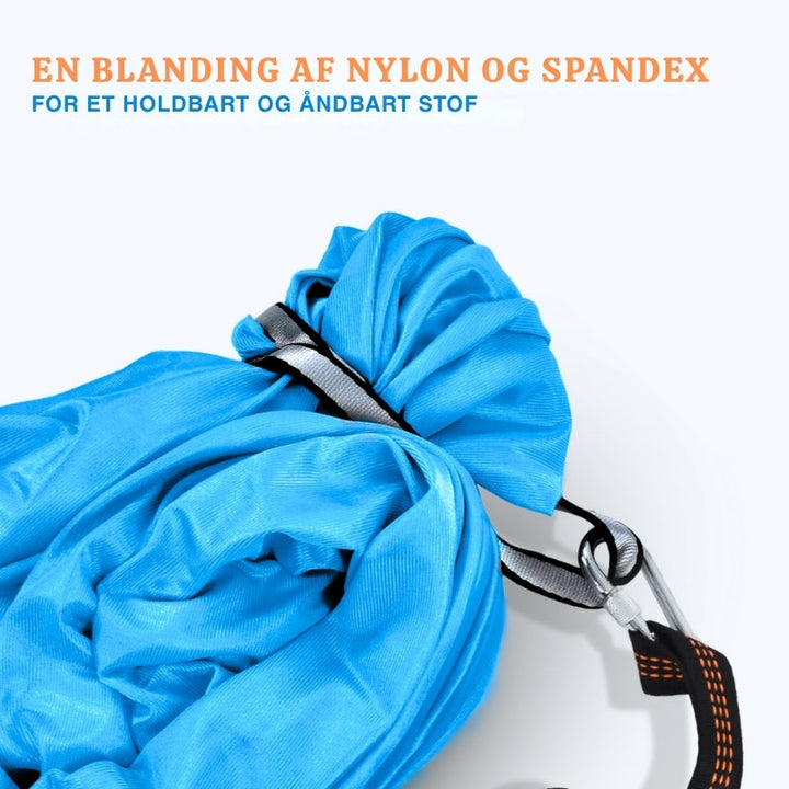 Farverig sansegynge til børn. Understøtter ro, fokus og sjov leg indendørs, perfekt for udvikling.