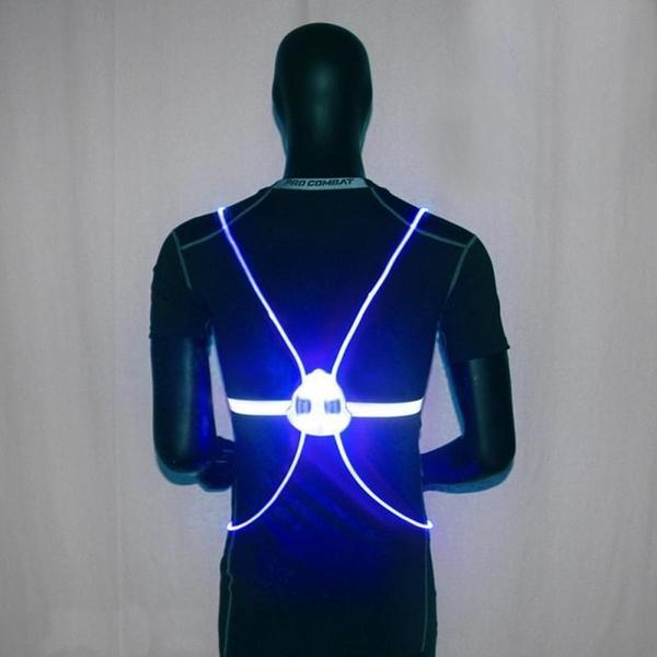 "Sikkerhedsvest med LED-lys 360° synlighed, reflekser og justerbare stropper, ideel til løb og cykling i mørke."