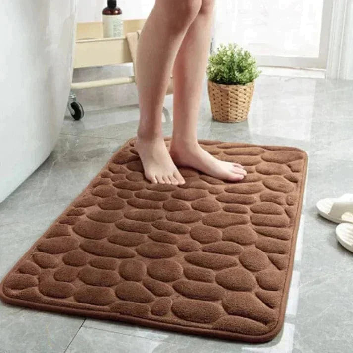 Komfortabel og skridsikker gulvmåtte til badeværelset, designet til at øge både sikkerhed og hygge.
