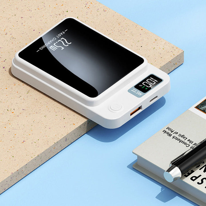 Avanceret powerbank med 22,5W hurtigopladning, Qi trådløs og USB-C. Pålidelig elektronik oplader.