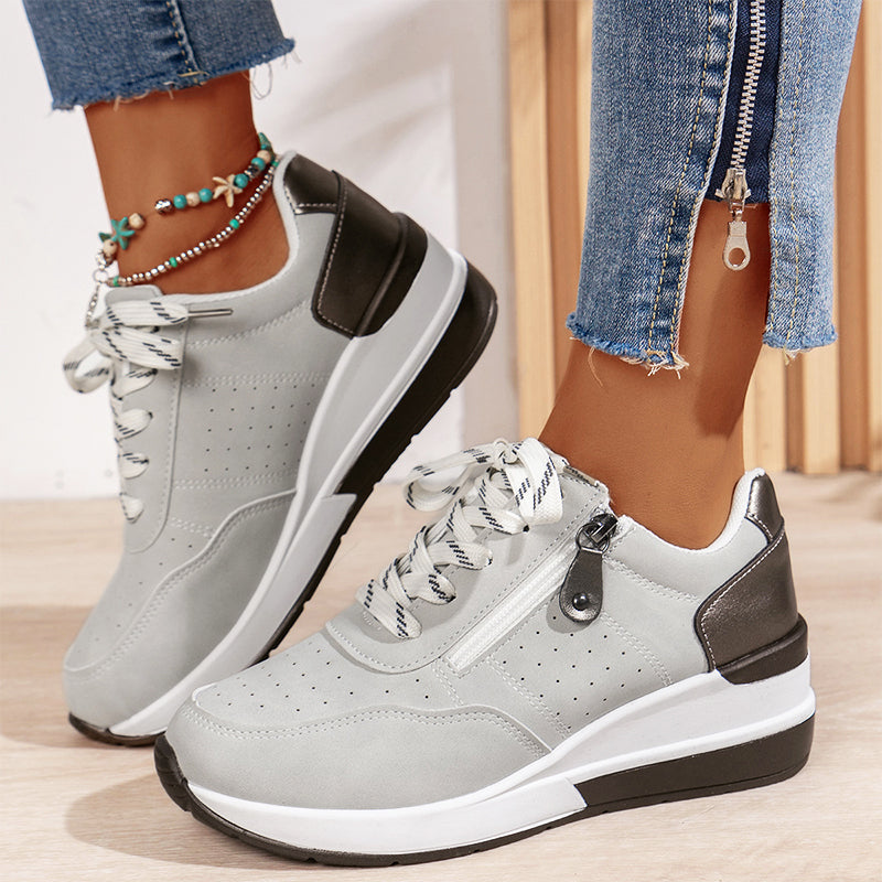 Hvide Solaria dame sneakers, komfortable hverdagssko med et stilfuldt look.