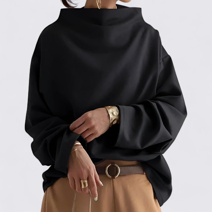 Minimalistisk sort dametøj: sweatshirt med høj hals, løs pasform, perfekt til en stilfuld hverdag.