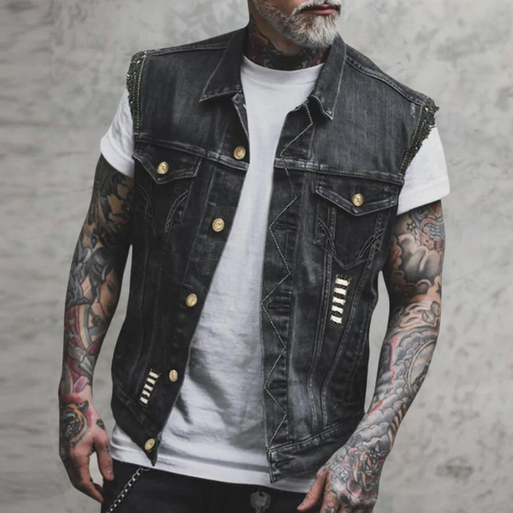 "Sort denimvest til mænd med gyldne knapper og brystlommer, retro look, egnet til hverdagsbrug og afslappede lejligheder."