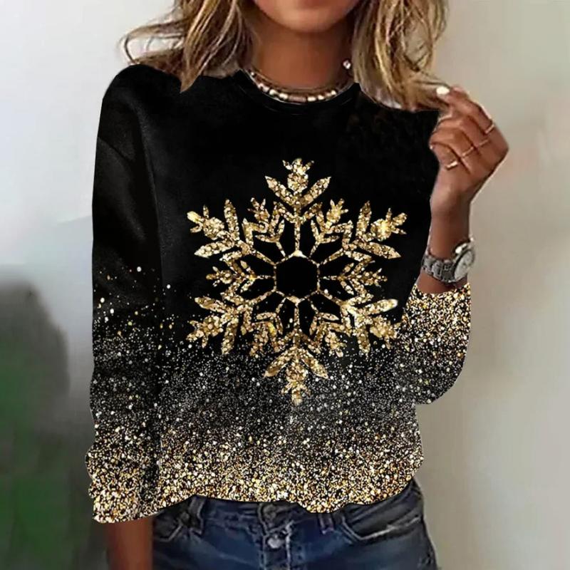 Sort elegant damebluse med snefnugprint og lange ærmer. Stilfuld top til festlig vintermode for kvinder.