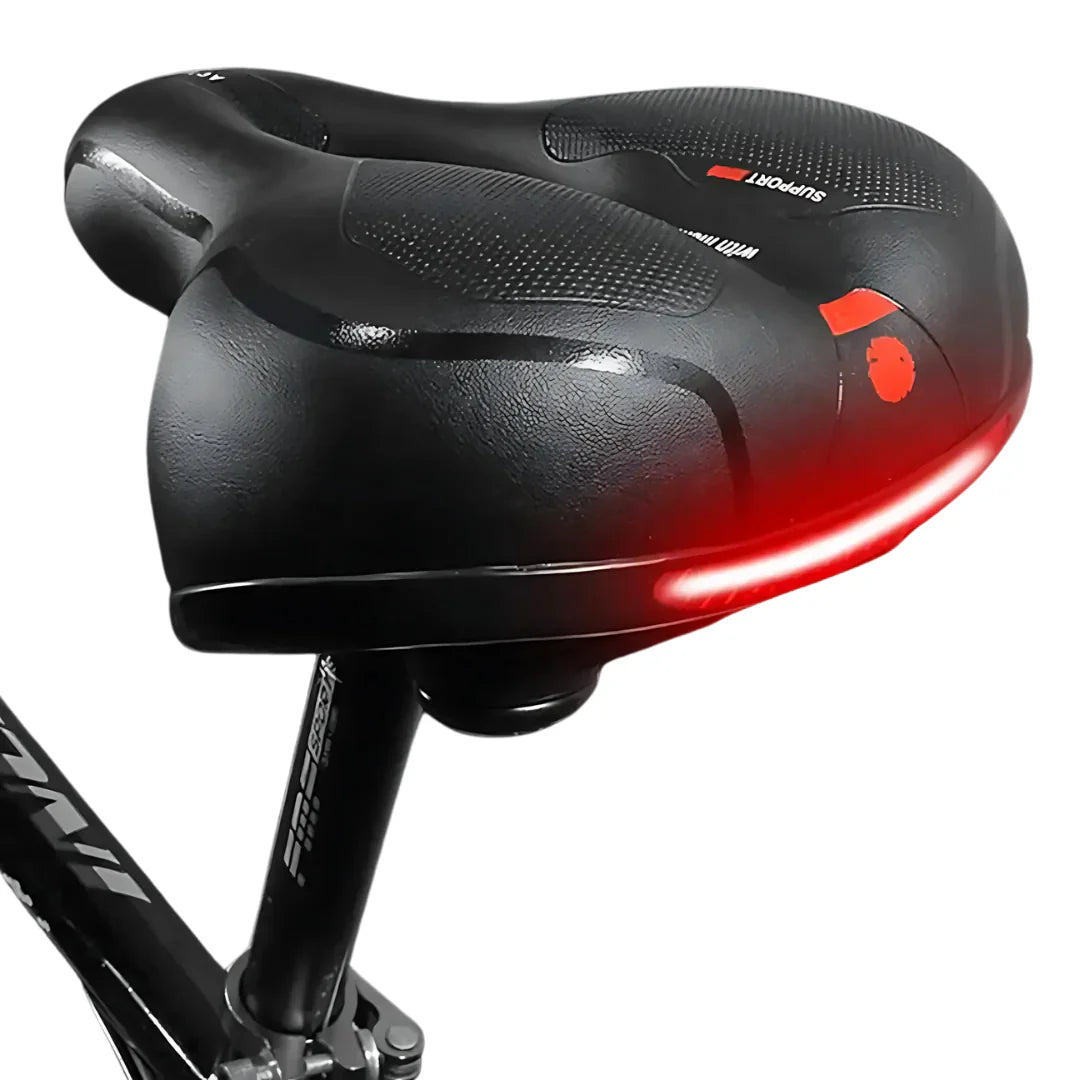 "Sort ergonomisk cykelsadel med hukommelsesskum og refleksstriber, ideel til lange cykelture for optimal komfort."