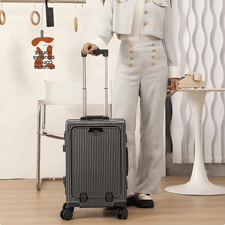 Robust sort polycarbonat kabinekuffert med aluminiumsramme og TSA-lås, ideel håndbagage.