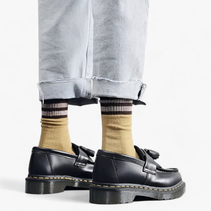 Elegant slip-on herresko med kvast, rund tå og tyk skridsikker sål. Ideel til alsidig hverdagsmode.