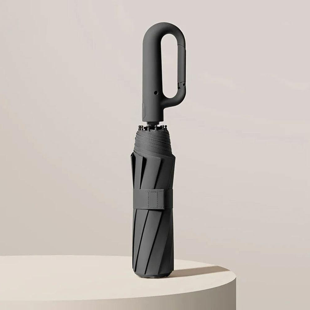 Sort kompakt automatisk paraply, vindfast og rejsevenlig, perfekt til unisex regnbeskyttelse.